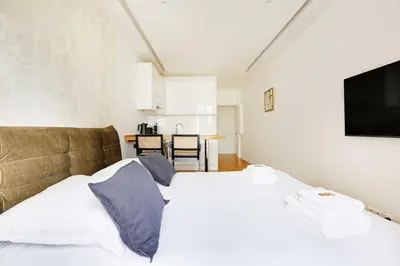 Un ou plusieurs lits dans un hébergement de l'établissement Cosy & chic studio - 2P - Levallois