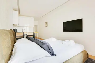 Un ou plusieurs lits dans un hébergement de l'établissement Cosy & chic studio - 2P - Levallois