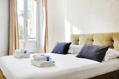 Un ou plusieurs lits dans un hébergement de l'établissement Cosy & chic studio - 2P - Levallois