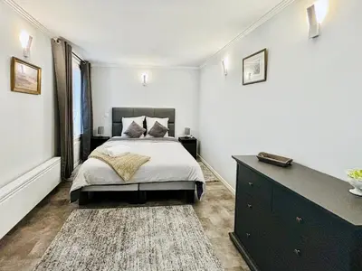 Un ou plusieurs lits dans un hébergement de l'établissement Luxury Apartment Paris Saint-Honoré - Rentaway BnB