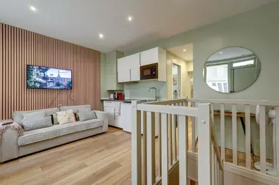 Cuisine ou kitchenette dans l'établissement Place de la Nation Cozy 2BD Duplex