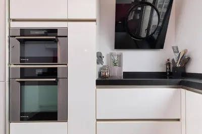 Cuisine ou kitchenette dans l'établissement Top floor with Eiffel Tower view and roof top