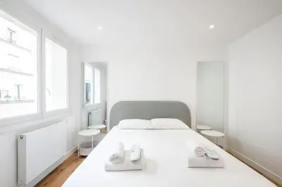 Un ou plusieurs lits dans un hébergement de l'établissement Magnifique appartement au cœur du 5ème arrondissement de Paris
