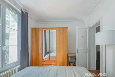 Un ou plusieurs lits dans un hébergement de l'établissement Flexliving - whole apartment - Lindet