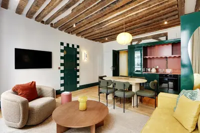 Coin salon dans l'établissement Paris Home Collection Serviced Apartments in Notre Dame - Rue Savoie