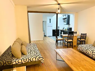 Coin salon dans l'établissement GRAND APPARTEMENT Paris 10
