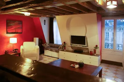 Télévision ou salle de divertissement dans l'établissement Amazing Rooftop Odeon Luxembourg