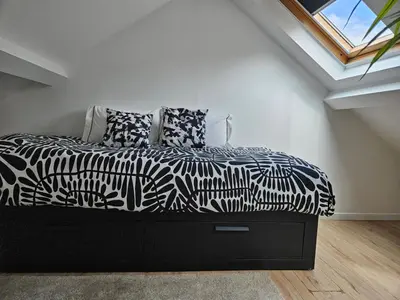 Un ou plusieurs lits dans un hébergement de l'établissement spacieux duplex Stade de France 24 pour 4 personnes