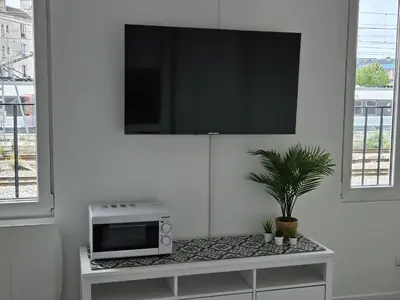 Cuisine ou kitchenette dans l'établissement spacieux duplex Stade de France 24 pour 4 personnes