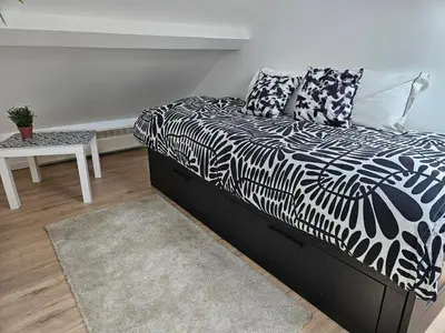 Un ou plusieurs lits dans un hébergement de l'établissement spacieux duplex Stade de France 24 pour 4 personnes