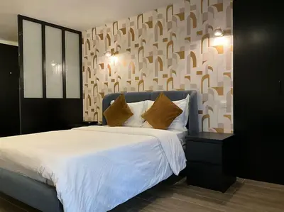 Un ou plusieurs lits dans un hébergement de l'établissement KS Paris studio appart near station Gare du Nord and gare de l Est
