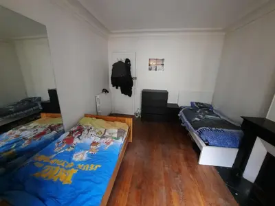 Un ou plusieurs lits dans un hébergement de l'établissement Appartement familial dans le 16é