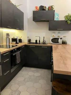 Cuisine ou kitchenette dans l'établissement Un petit cocon en plein cœur du 11eme