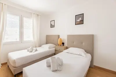 Un ou plusieurs lits dans un hébergement de l'établissement New York-Superbe appartement vue Tour Eiffel pont de l'Alma