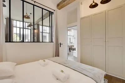 Un ou plusieurs lits dans un hébergement de l'établissement Magnifique loft 6P proche Bastille