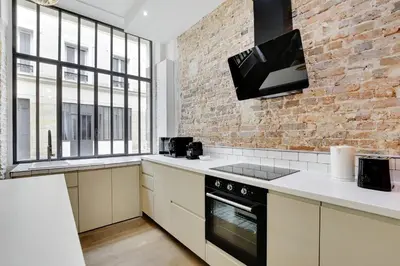 Cuisine ou kitchenette dans l'établissement Magnifique loft 6P proche Bastille