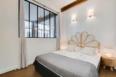 Un ou plusieurs lits dans un hébergement de l'établissement Magnifique loft 6P proche Bastille