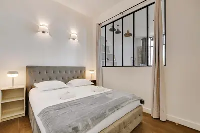 Un ou plusieurs lits dans un hébergement de l'établissement Magnifique loft 6P proche Bastille