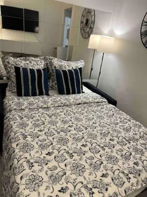 Un ou plusieurs lits dans un hébergement de l'établissement Appartement T2 cosy et lumineux au cœur de Paris12
