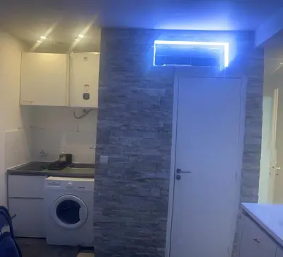 Cuisine ou kitchenette dans l'établissement Le cocon