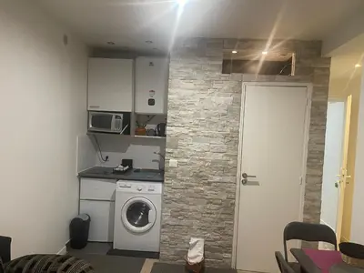 Cuisine ou kitchenette dans l'établissement Le cocon