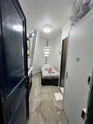 Un ou plusieurs lits dans un hébergement de l'établissement PARIS BASTILLE BERCY GARE DE LYON CHAMBRE CLIMATISEE 9m2 idéal 1 pers ,max 2 pers