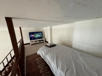 Un ou plusieurs lits dans un hébergement de l'établissement 2 chambres 9mn Arc de Triomphe