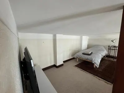 Un ou plusieurs lits dans un hébergement de l'établissement 2 chambres 9mn Arc de Triomphe