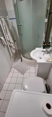 Salle de bains dans l'établissement Le Petit Paris