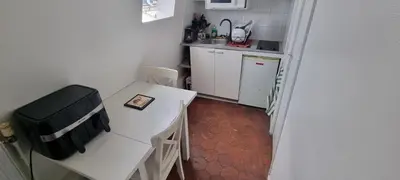 Cuisine ou kitchenette dans l'établissement Le Petit Paris