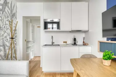 Cuisine ou kitchenette dans l'établissement Le cocon des Épinettes