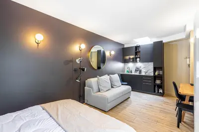 Un ou plusieurs lits dans un hébergement de l'établissement GuestReady - Nice urban hideout near Montmartre
