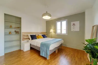 Un ou plusieurs lits dans un hébergement de l'établissement Residence Reine - Boulogne - Paris
