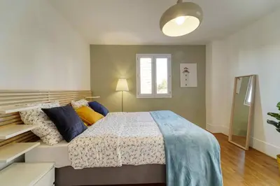 Un ou plusieurs lits dans un hébergement de l'établissement Residence Reine - Boulogne - Paris