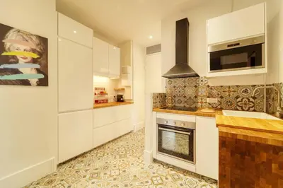 Cuisine ou kitchenette dans l'établissement Residence Reine - Boulogne - Paris