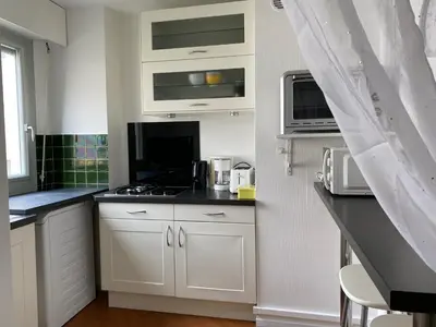Cuisine ou kitchenette dans l'établissement Studio Angela proche Tour Eiffel