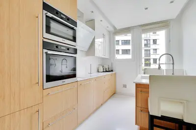 Cuisine ou kitchenette dans l'établissement Charming Appt with a-c- 1bd-2p - Tour Eiffel
