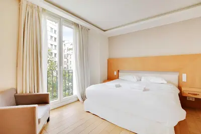 Un ou plusieurs lits dans un hébergement de l'établissement Charming Appt with a-c- 1bd-2p - Tour Eiffel