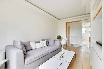 Coin salon dans l'établissement Charming Appt with a-c- 1bd-2p - Tour Eiffel