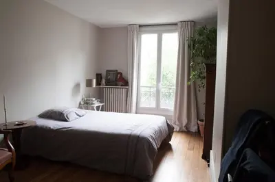 Un ou plusieurs lits dans un hébergement de l'établissement So Cute 55m2 And Quiet With A Courtyard Garden