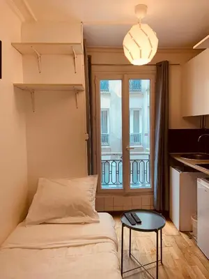 Un ou plusieurs lits dans un hébergement de l'établissement Studio Anvers