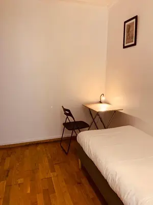 Un ou plusieurs lits dans un hébergement de l'établissement Studio Anvers