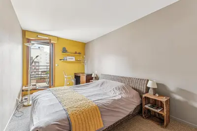 Un ou plusieurs lits dans un hébergement de l'établissement Appartement duplex dans le Saint Lambert by Weekome