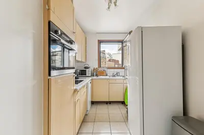 Cuisine ou kitchenette dans l'établissement Appartement duplex dans le Saint Lambert by Weekome