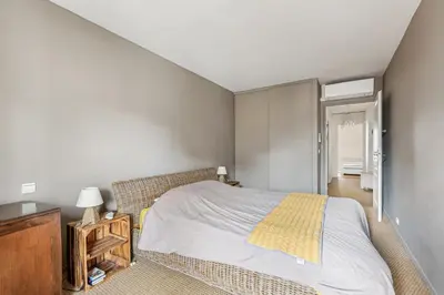 Un ou plusieurs lits dans un hébergement de l'établissement Appartement duplex dans le Saint Lambert by Weekome