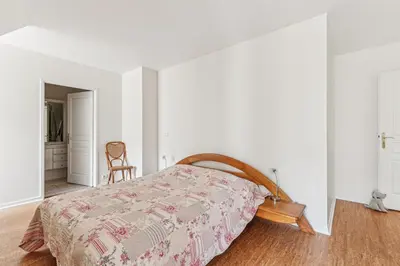 Un ou plusieurs lits dans un hébergement de l'établissement Appartement duplex dans le Saint Lambert by Weekome