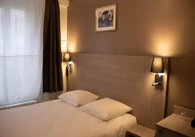 Un ou plusieurs lits dans un hébergement de l'établissement Paris Rooms & Dreams Hotel