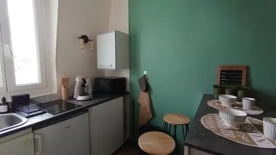 Cuisine ou kitchenette dans l'établissement Le Nid Douillet