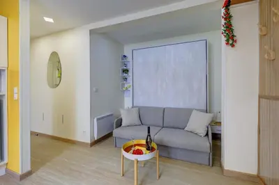 Coin salon dans l'établissement 408 Suite Montorgueil - Superbe Studio à Paris