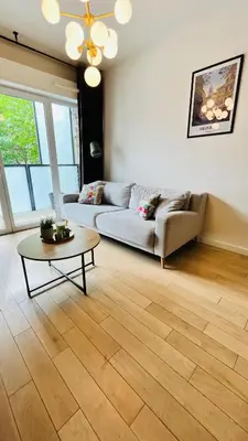 Coin salon dans l'établissement Riviera Suite - Spacieux T3 - 5 min du métro- Paris centre à 10min